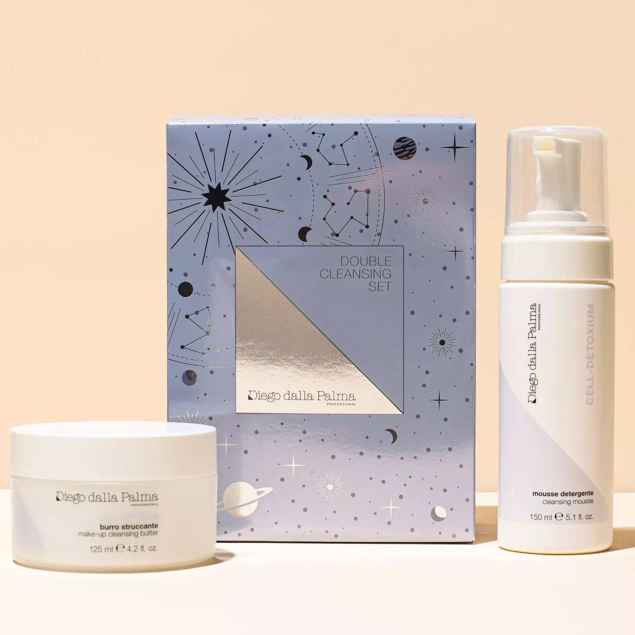 Double cleansing set with a box featuring celestial design on a beige background