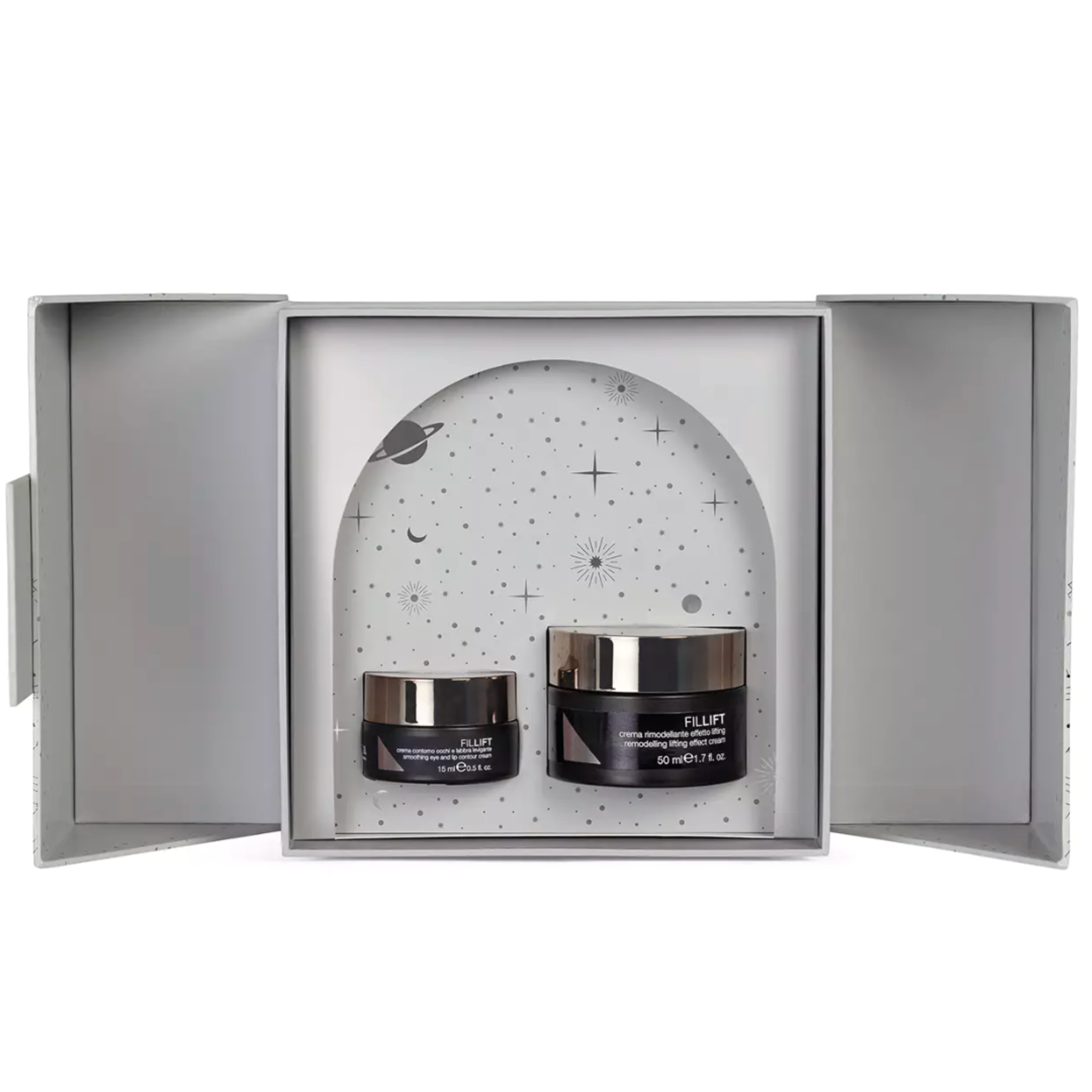 Two skincare jars in a decorative box with a starry design
