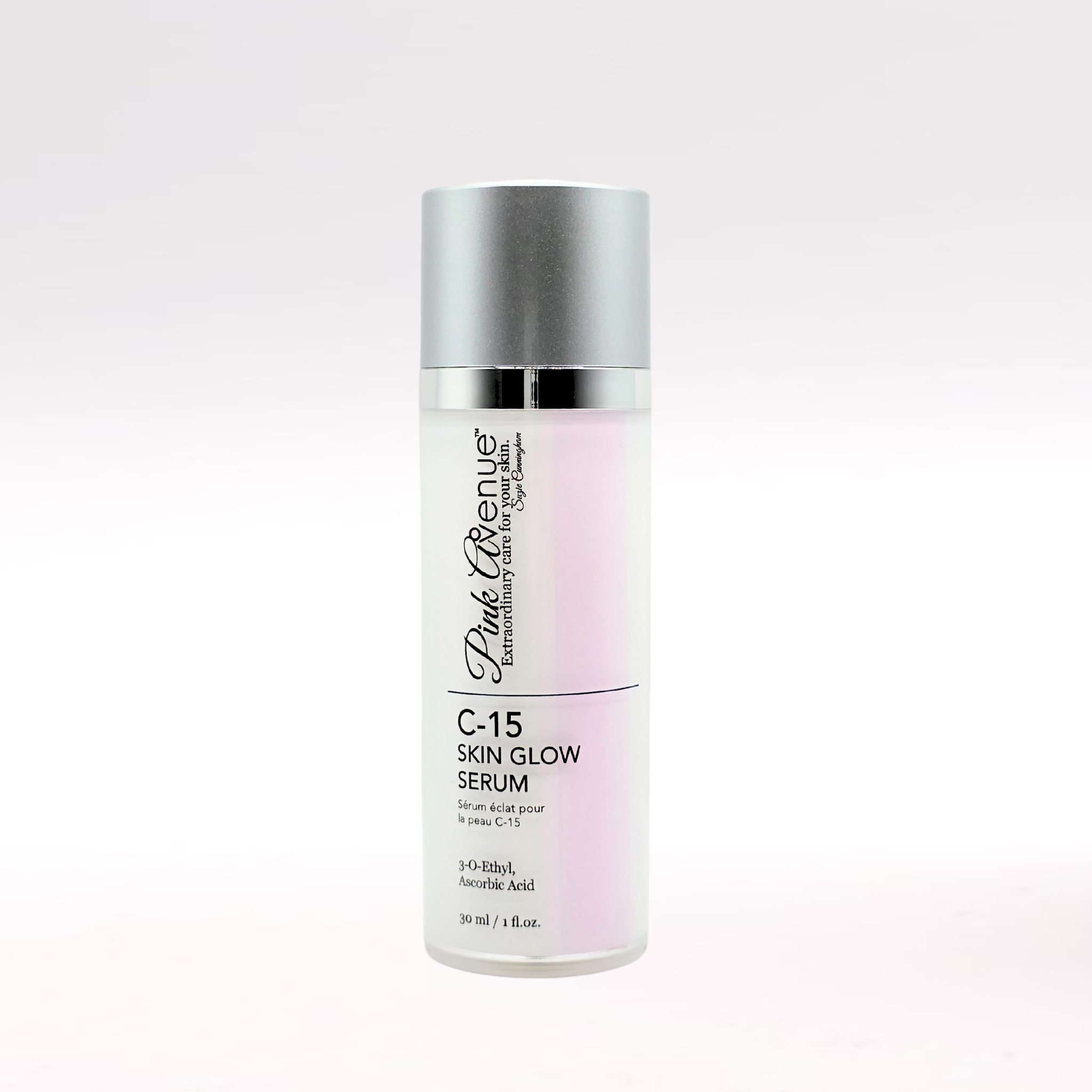 Pink Avenue C15 Serum bottle on a pale pink background