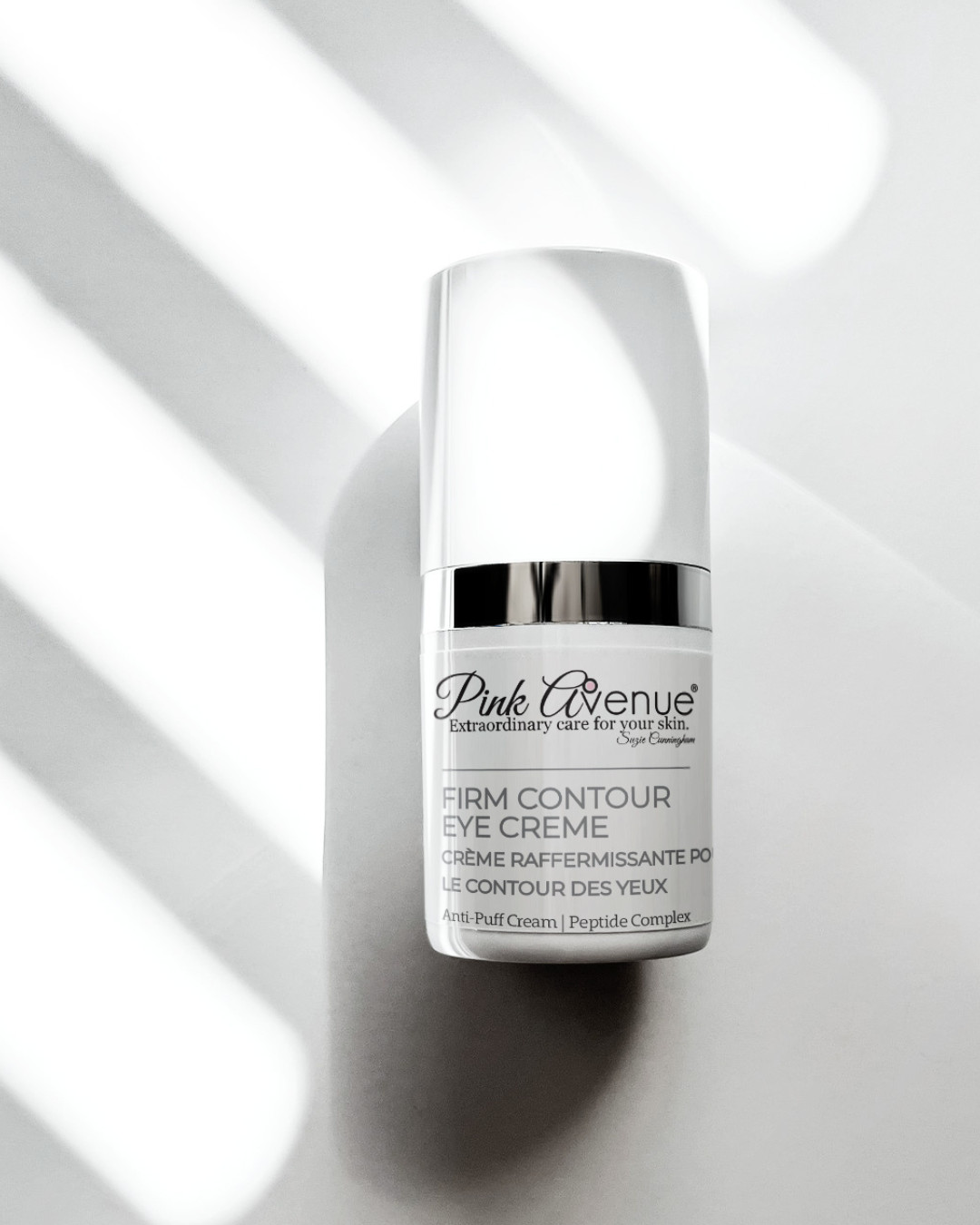 Pink Avenue Firm Contour Eye Cream, a medical-grade eye moisturizer formulated for all skin types. AM and PM eye care. Contains peptides such as Palmitoyl Tetrapeptide-7 and Dipeptide-2, with Algae Extract, Sea Whip Extract, and Hesperidin Methyl Chalcone. Glycerin and Butylene Glycol support hydration. Formulated to improve the appearance of the eye area, including skin texture and visible signs of fatigue. Suitable for use around the delicate eye contour.