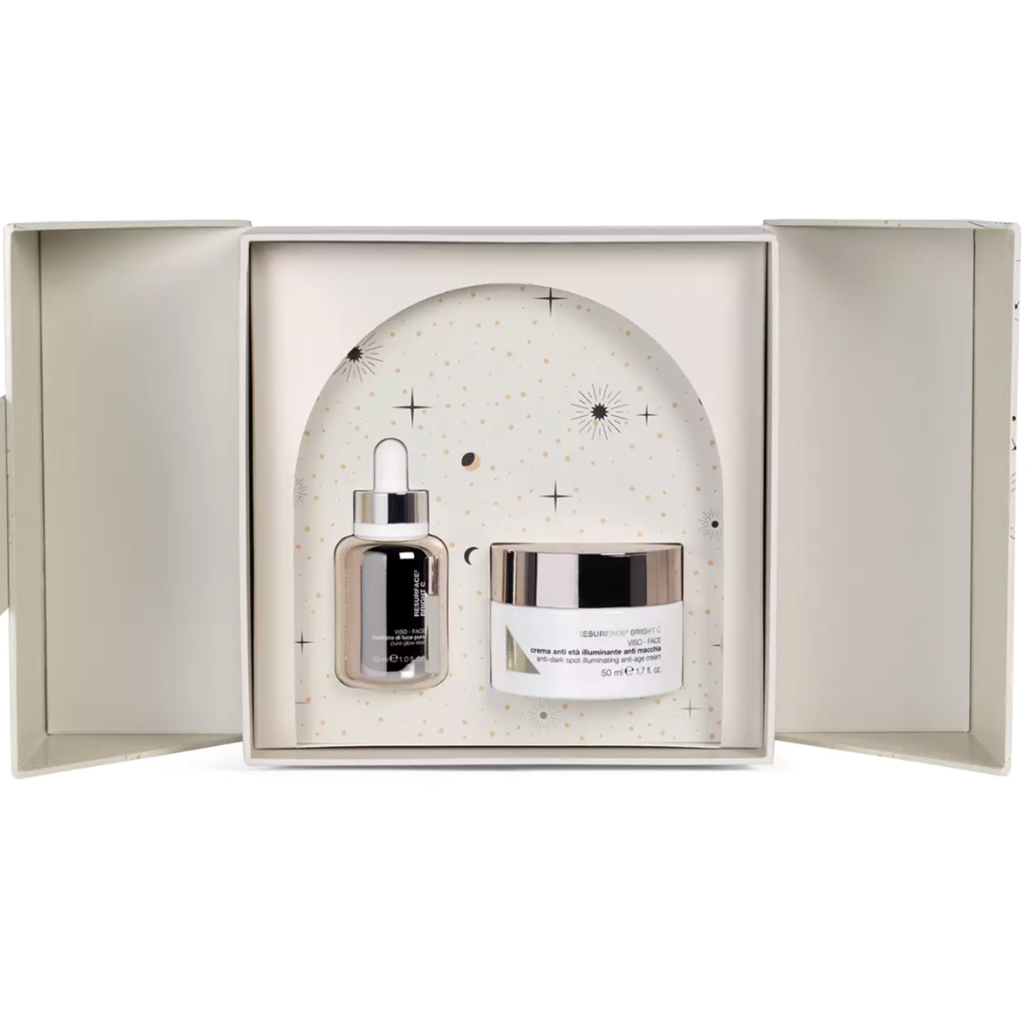 Skincare set with serum and cream in a decorative box on a white background