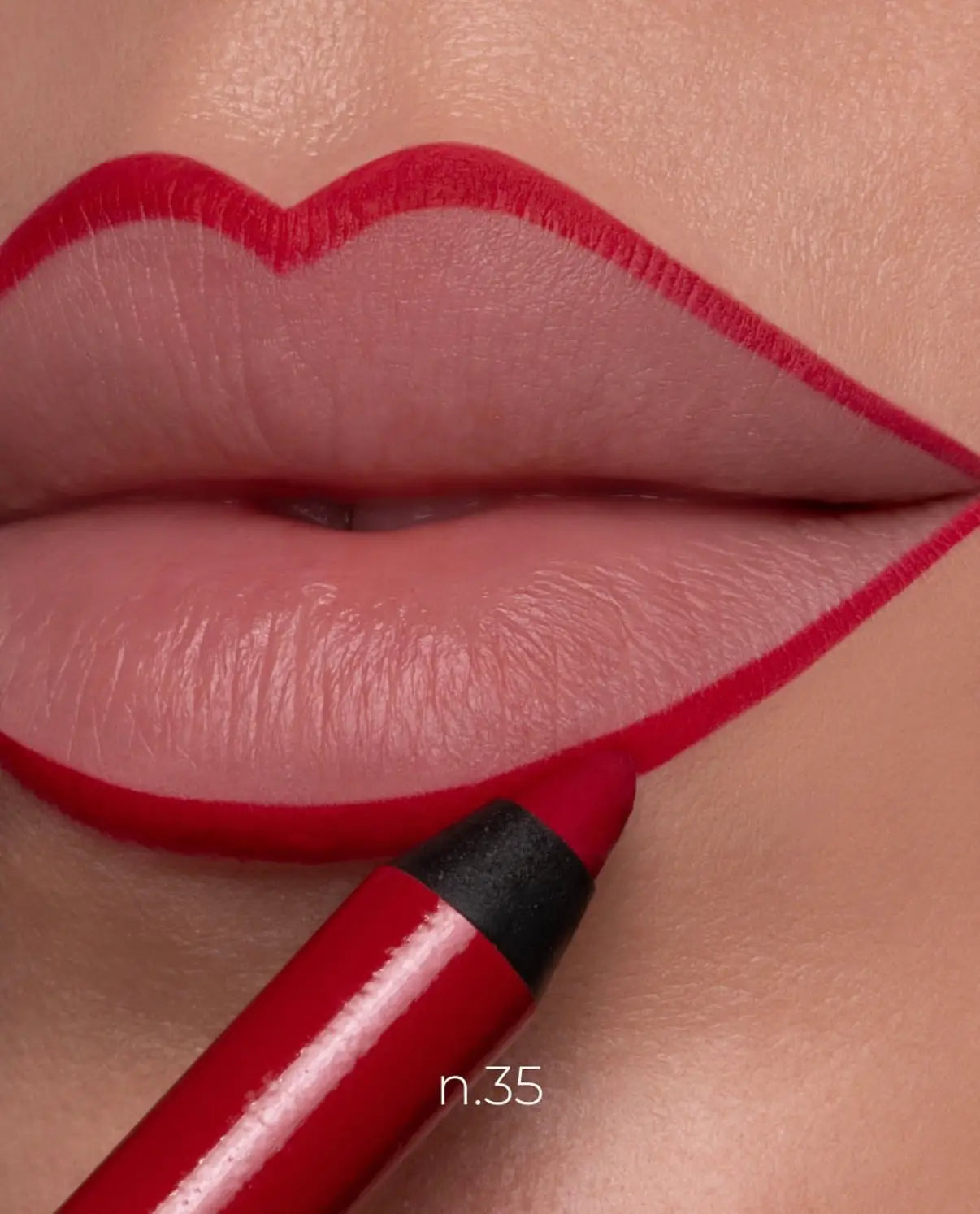 Close-up of lips outlined with a bright red lip liner pencil, with the pencil tip visible at the bottom and the shade labeled 'n.35'.