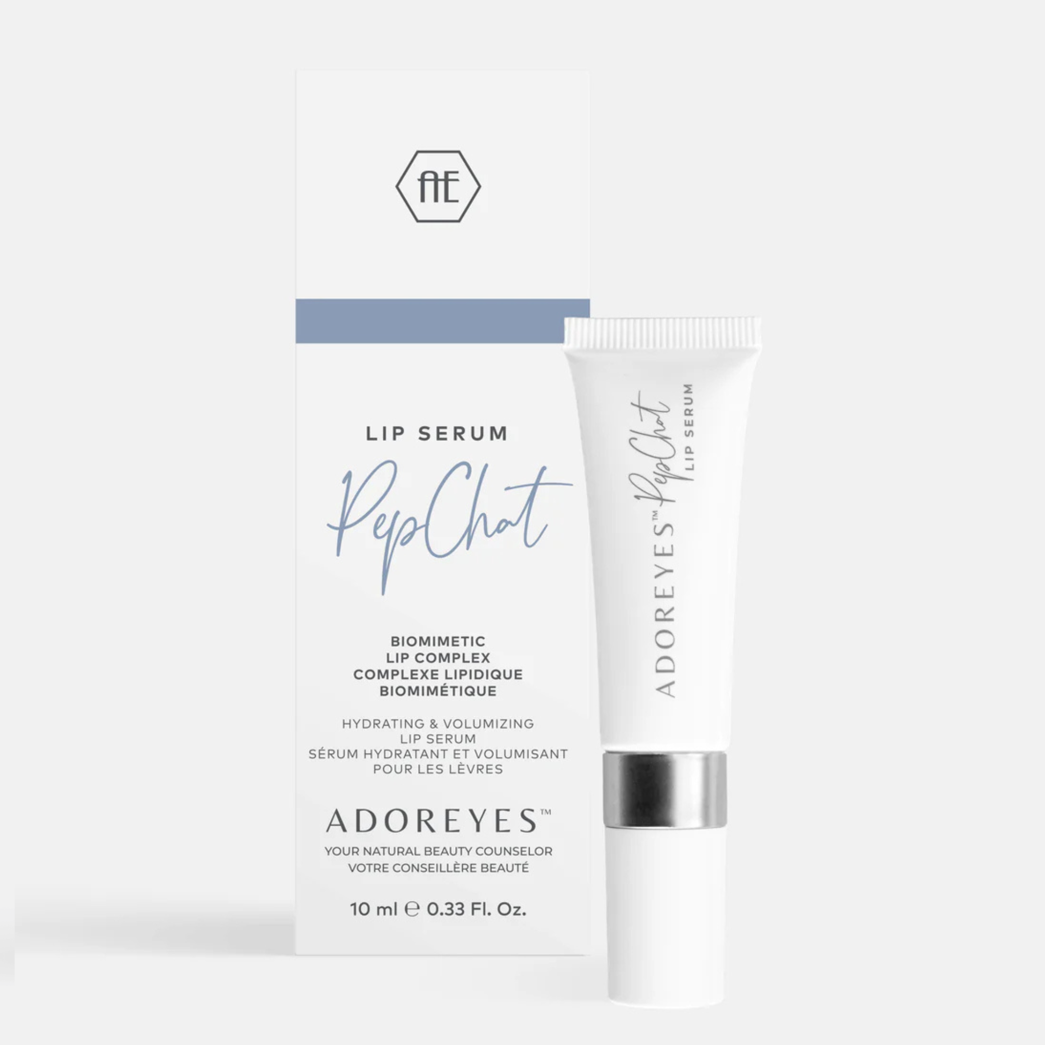 Enpakado de Adoreyes lipserumo sur blanka fono