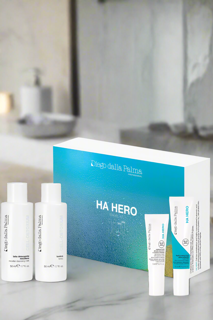 Travel-sized hyaluronic acid skincare kit with multiple small bottles and containers, HA Hero collection by Diego Dalla Palma  Professional Skin Care
