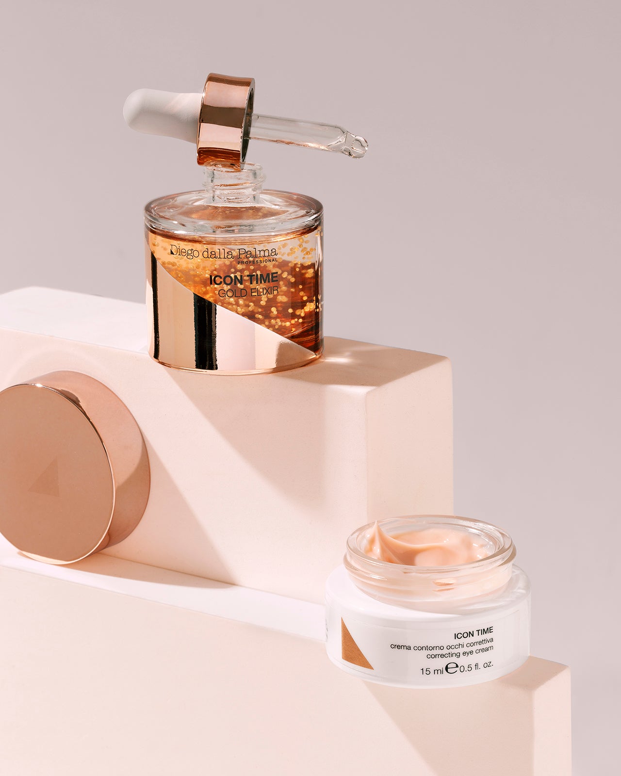 Skincare product with dropper and jars on a neutral background