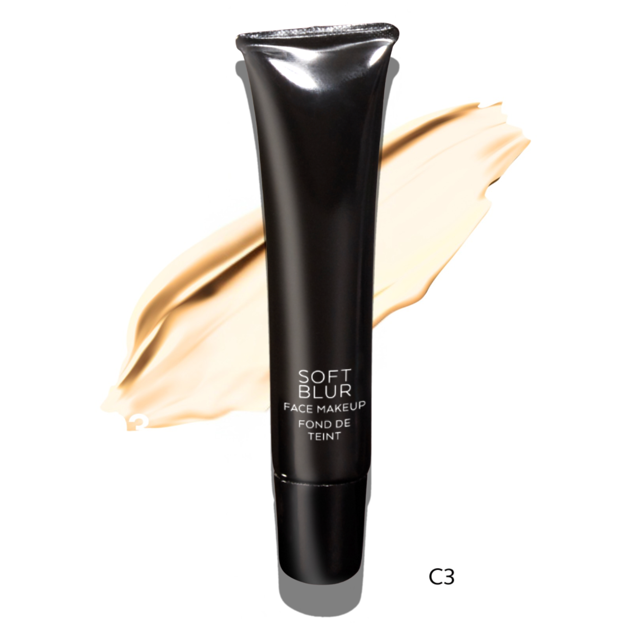 Black makeup foundation bottle with a swatch of beige color on a white background