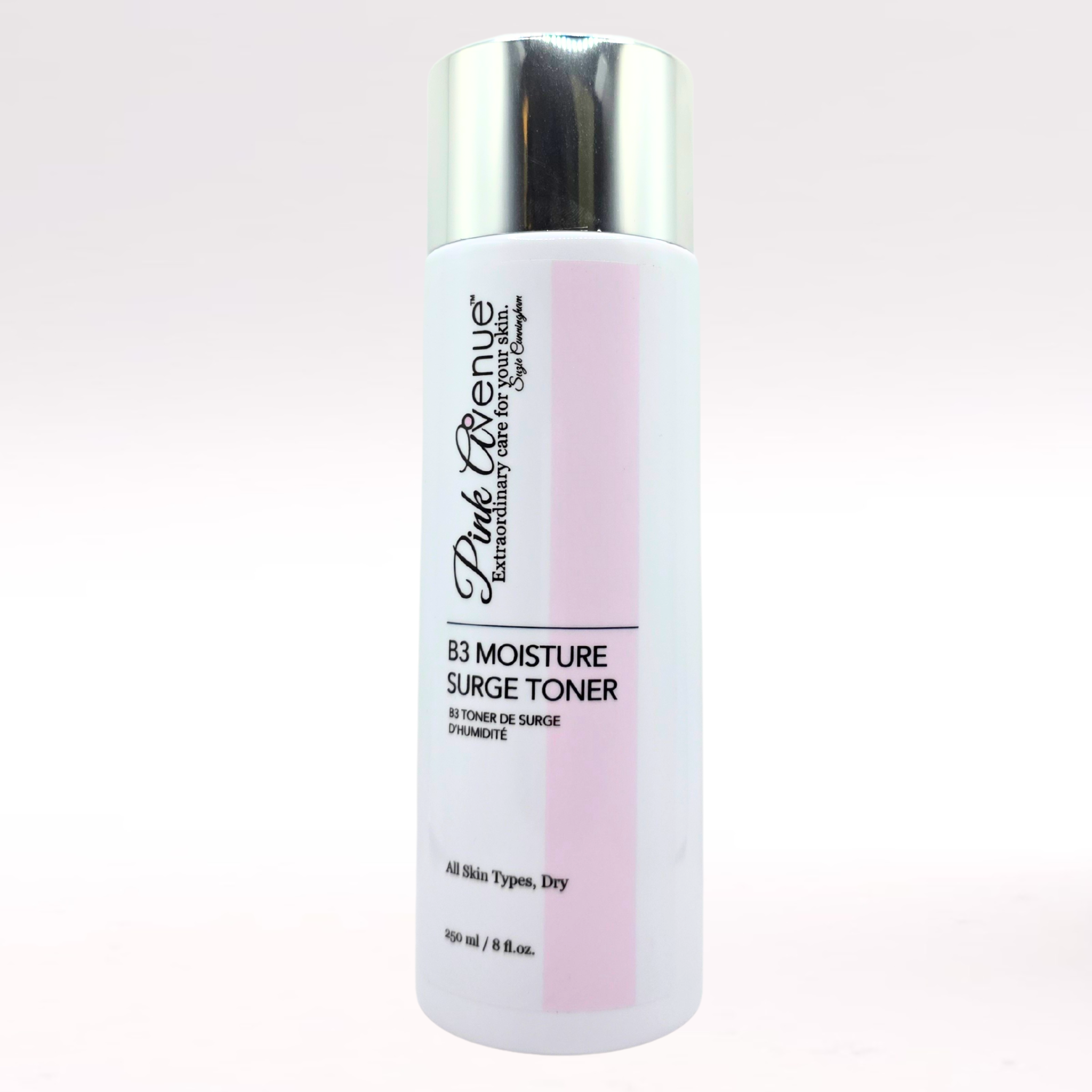 Bottle of Pink Avenue B3 Moisture Surge Toner on a light pink background