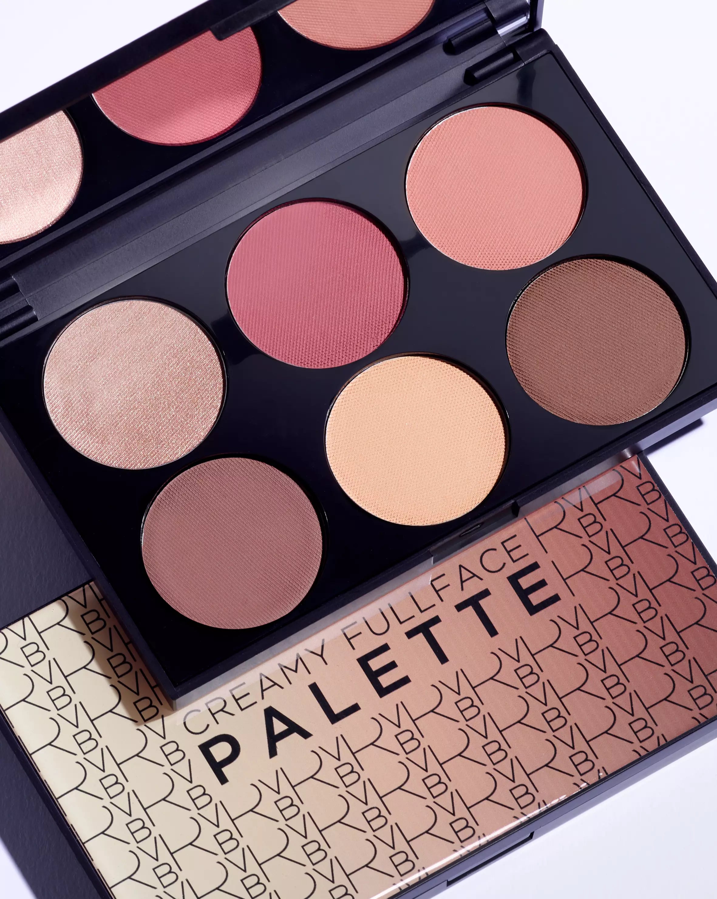 Makeup palette with various shades of cream and blush colors, featuring the brand 'BYPHER'.
