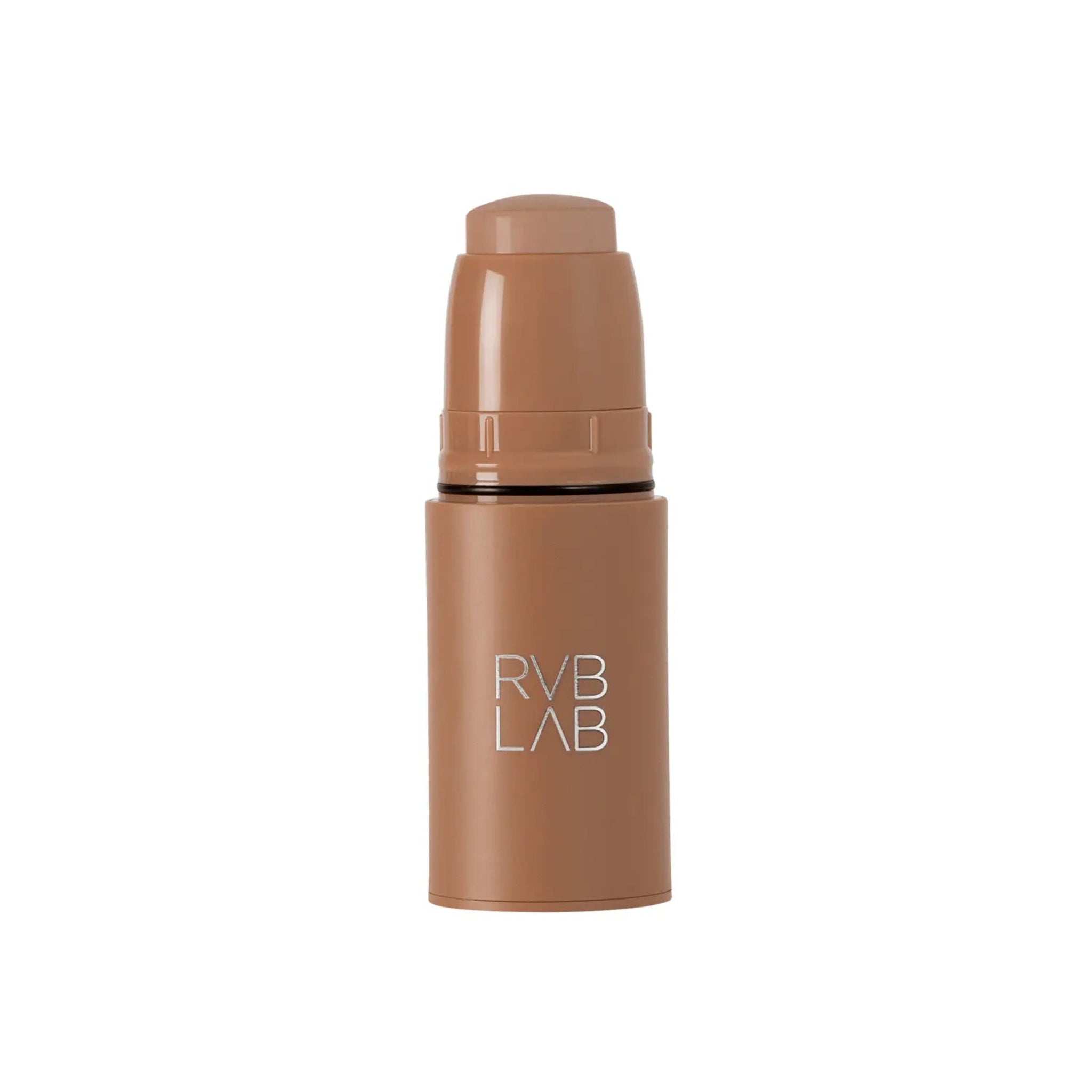 A cylindrical makeup stick in a warm medium tan shade, featuring a matching cap and the brand name 'RVB LAB' printed vertically in white on the front, set against a plain white background.
