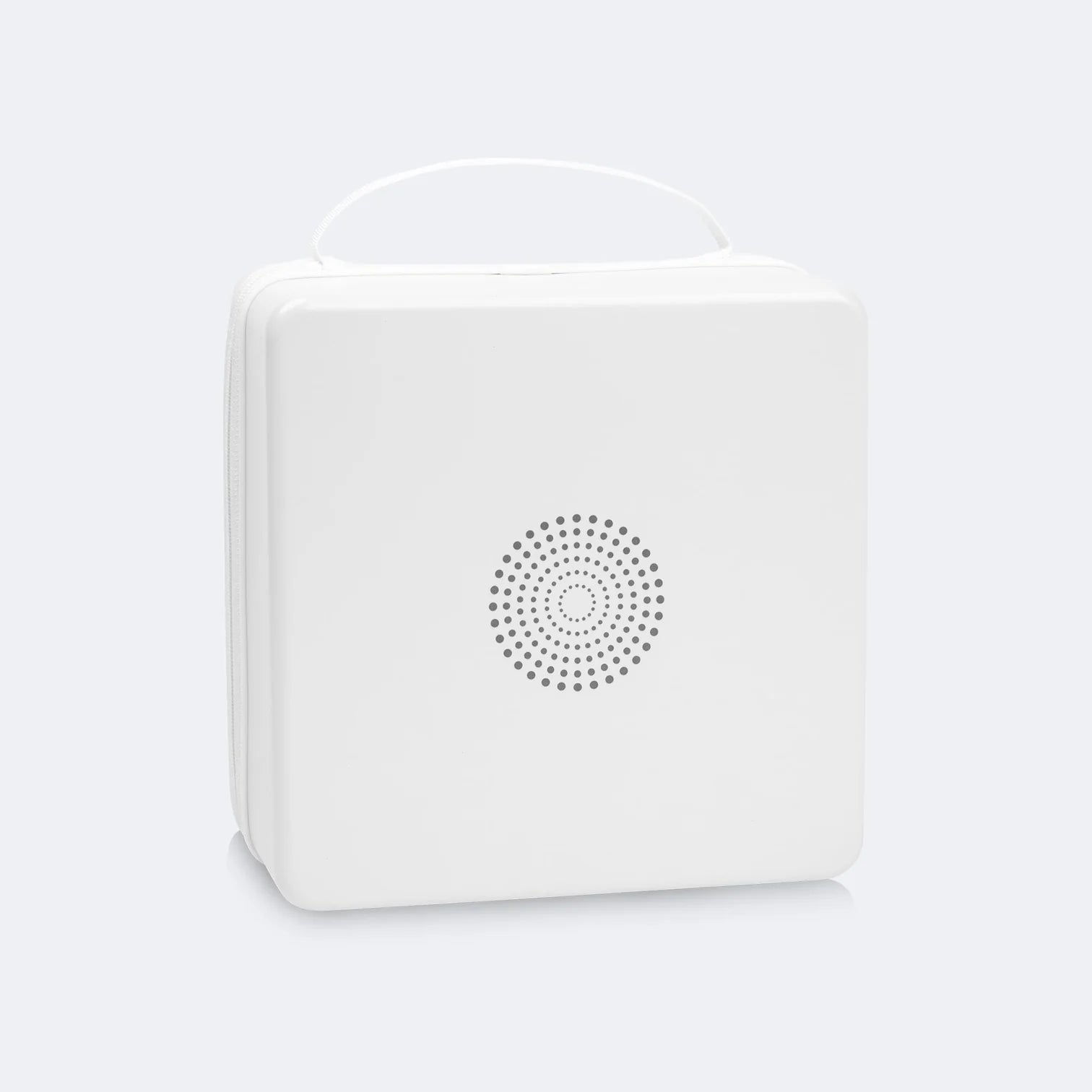 White electronic device with a circular pattern on a light gray background
